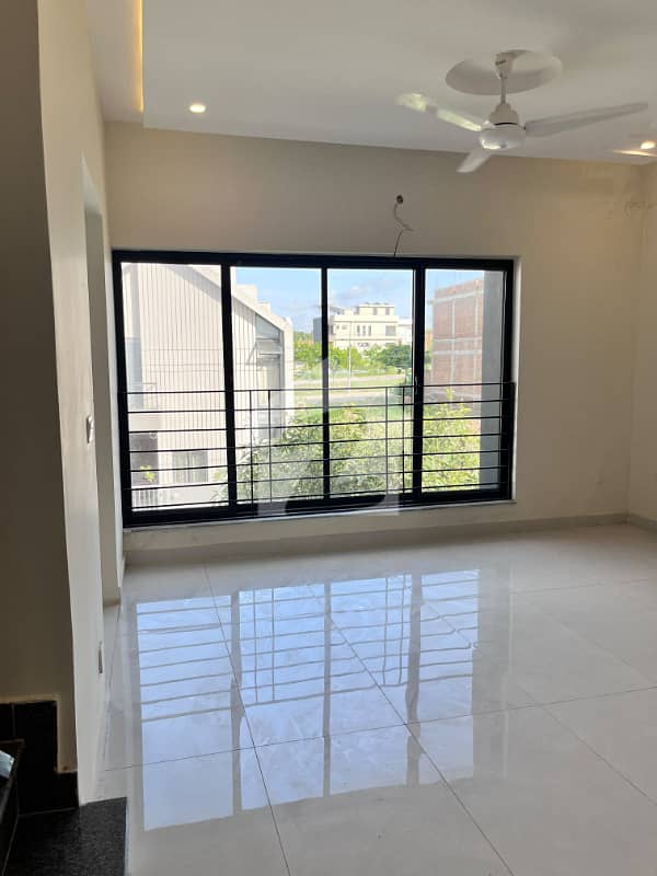 Brand-New 5 Marla House In DHA Phase 5 Modern Luxury, Move-In Ready — photo 1